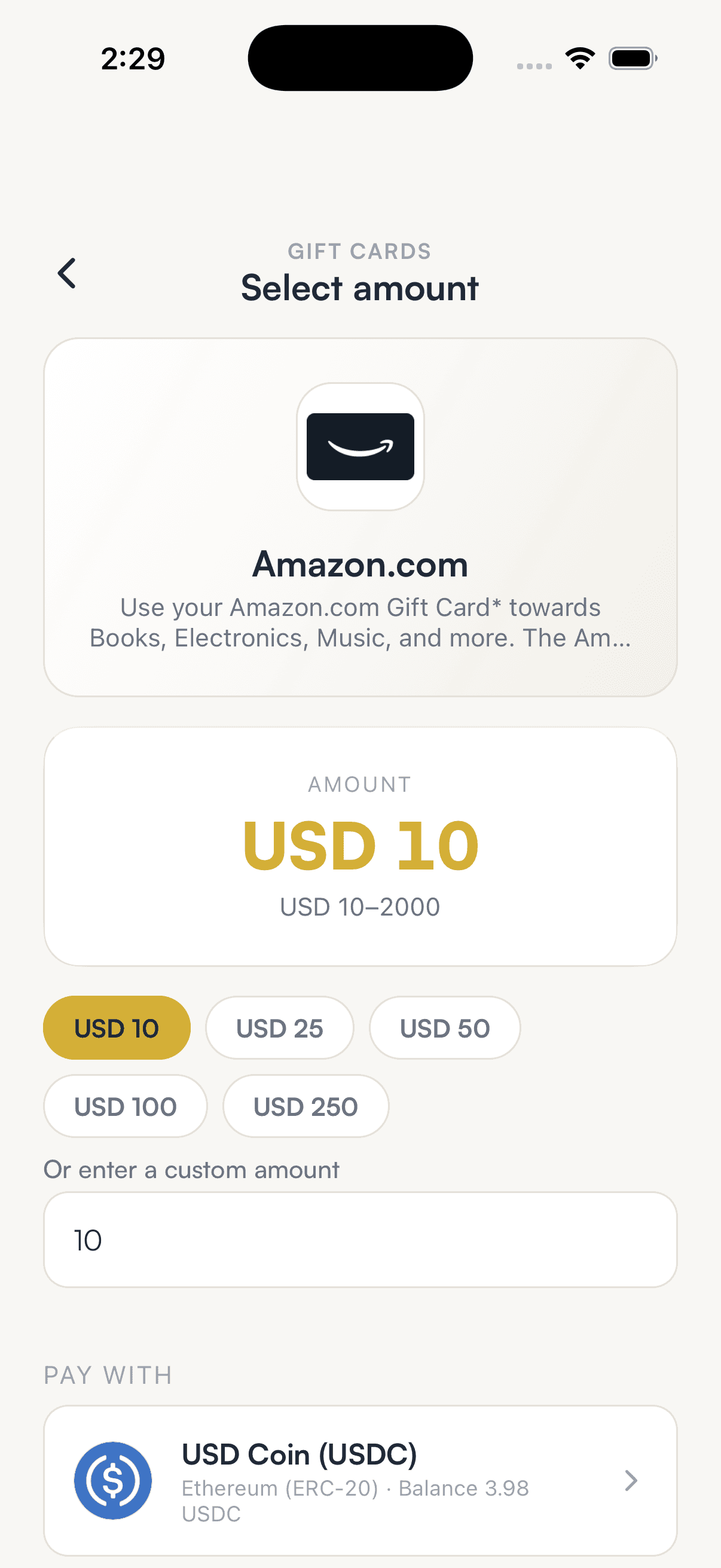The Amazon.com gift card screen with USD 10 selected and USD Coin as the payment