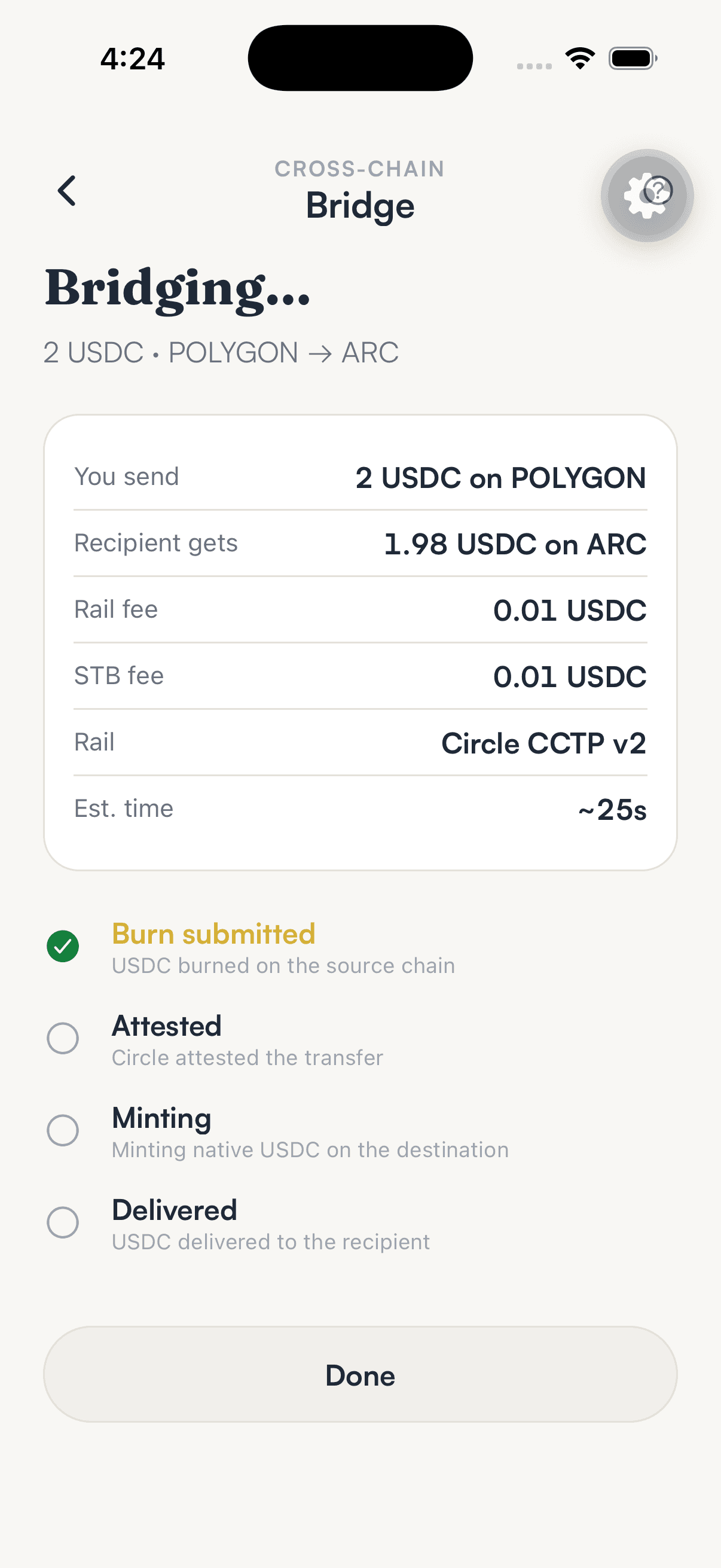 The SpendTheBits bridging screen showing burn submitted, attested, minting and delivered stages