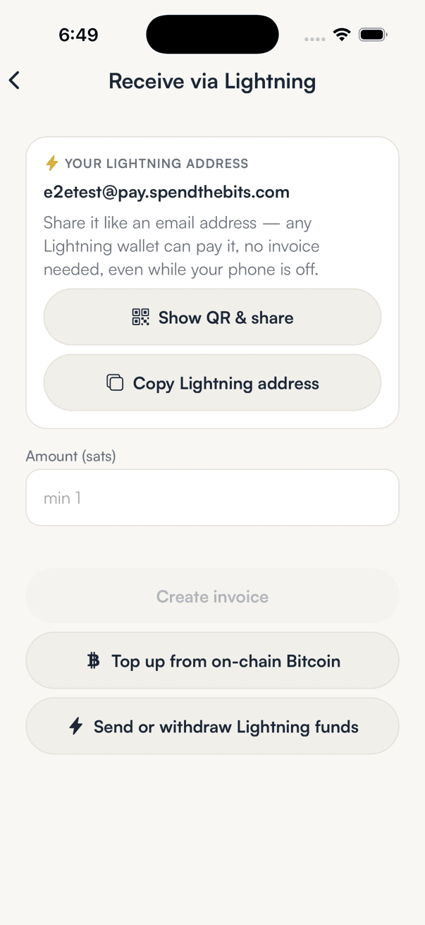 Receive via Lightning screen with the Lightning address card, an Amount in sats field and a Create invoice button
